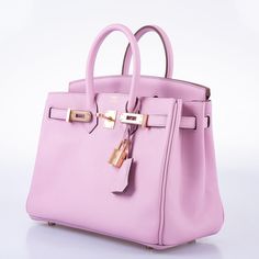 Hermès is renowned for its exquisite use of colors, including the visually striking Mauve Sylvestre pink. This particular color is showcased in the interior lining of the handbag, which is made from luxurious swift leather. The interior also boasts a zip pocket with an engraved Hermès pull, as well as two open pockets on the opposite side, offering ample storage space. The hardware is fashioned from lush rose gold, adding an extra touch of elegance to the bag. With a Baby Birkin size of 25cm, this handbag is perfectly proportioned for carrying your essentials in style.  Condition: Store FreshHardware: Rose GoldColor: Mauve SylvestreCollection: 2021, ZMaterial: Swift Leather25cm: 10" W x 5" D x 8"H Hermes Mauve Sylvestre, Hermes Bags Birkin, Skor Sneakers Nike, Mauve Sylvestre, Wild Lavender, Birkin Bags, Skor Sneakers, Leather Rose, Dream Bags