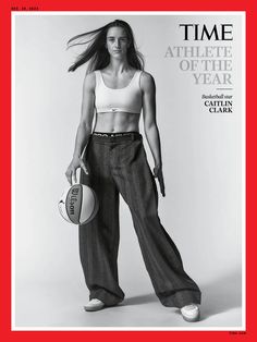 a woman is holding a football and posing for the cover of time magazine, with her hair blowing in the wind