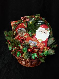 a basket filled with lots of christmas items