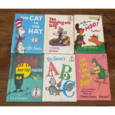 six dr seuss books on a wooden table