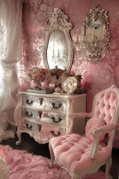 a bedroom with pink walls and furniture in the room, including a mirror on the wall