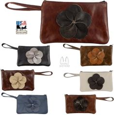 four different colored leather purses with flowers on the front and one in the back