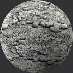 an image of a sphere with rocks on the surface and water running down it's sides