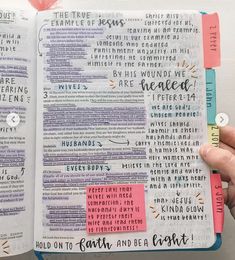 someone is holding an open bible in their hand with the words on it and two sticky notes