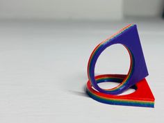 With a rainbow of colors, this simple statement ring will brighten every day. These 3D printed rings make for a simple gift and a great conversation starter when being worn. It is lightweight, but very durable.