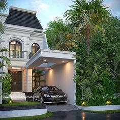 a black car parked in front of a white house with palm trees and bushes around it