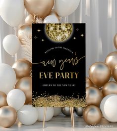 a black and gold new years eve party sign surrounded by white and gold balloons in the background