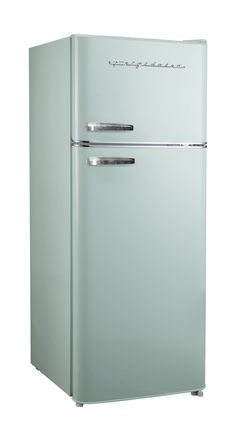 a green refrigerator freezer sitting on top of a white floor