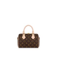 Like a diminutive version of the house’s historic speedy travel bag, the speedy bandoulière 20 handbag is crafted from monogram canvas with natural cowhide trim. In addition to the rolled leather top handles, there’s a wide detachable and adjustable textile strap with a woven louis vuitton signature. This bag’s classic design is completed with red textile lining. Louis Vuitton Mini Speedy, Red Textiles, Speedy Bag, Sac Louis Vuitton, Louis Vuitton Speedy Bandouliere, Mini Backpacks, Bags Aesthetic, Louis Vuitton Official, Editing Service