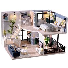 a doll house with furniture and decor on the top floor is shown in this image