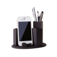 a cell phone and pen holder on a white background with an iphone in the center