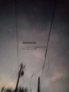 an image of the sky with clouds and trees in it that reads metanoia