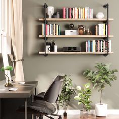 a desk with a chair, bookshelf and potted plants