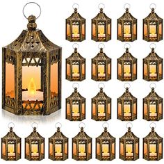 a set of twelve hanging lanterns with candles in them and the lights on each lantern