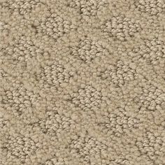 an up close shot of a beige carpet