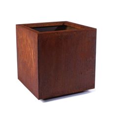 a square wooden box with a black top