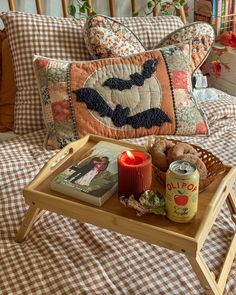 a tray with a candle and some food on it