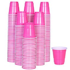 pink cups are lined up next to each other