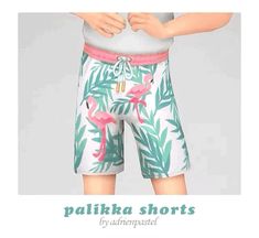 the shorts have pink flamingos on them and palm leaves all over them, but there is no image to describe