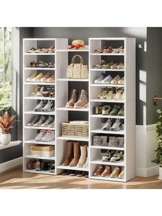 a white shelf filled with lots of shoes