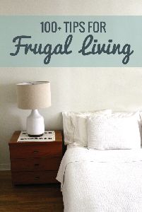 a bedroom with a bed, nightstand and wall sticker that says 101 tips for frugal living