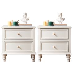 two white nightstands side by side with coffee cups on top and one holding a mug