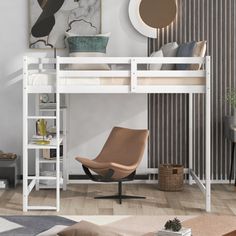 a white loft bed sitting next to a living room with a chair and table in front of it