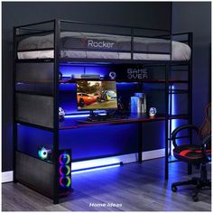 a bunk bed with a computer desk underneath it