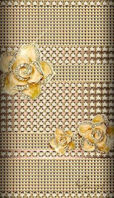 an image of a wall with flowers and laces on the bottom, as well as gold trim