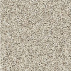 a beige carpet with small white dots on it