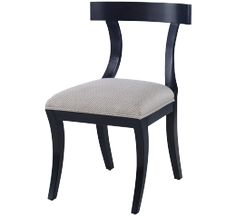 a black and white chair with a beige seat cushion on the back of it's side