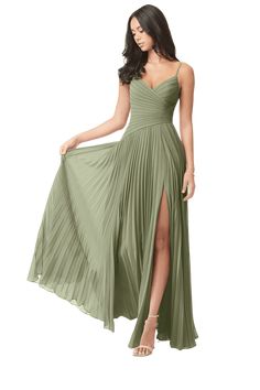 a woman wearing a green dress with a slit down the side and one leg up