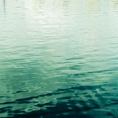 a boat floating on top of a large body of water