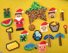 a bunch of pixelated items are on a table together, including santa's hat and other holiday decorations