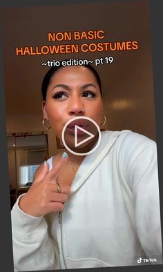 a woman making a funny face while wearing a white sweater and hoop earrings with the caption non basic halloween costumes