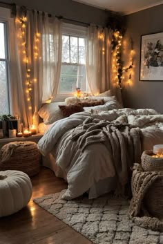 a bedroom decorated with lights and blankets