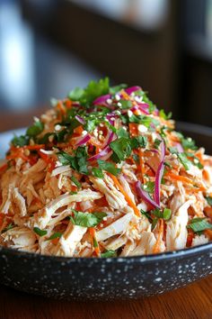 Shredded chicken salad with carrots, red onions, and cilantro in a black bowl. Chicken Recipe With Heavy Cream, Shredded Chicken Recipes Keto, Shredded Chicken Recipes For Dinner, Shredded Chicken Dishes, Easy Shredded Chicken Recipes, Chicken Meal Ideas, Chicken Recipes Keto, Shredded Chicken Recipe, Chicken Recipes For Dinner