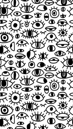 an abstract black and white background with many different types of eyeballs on it