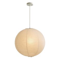 a white light hanging from the ceiling with a circular shade on it's side