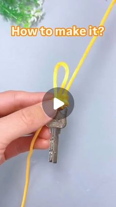 a person holding a key with the words how to make it?