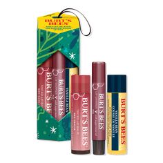 Tinted Lip Balm and Lip Shimmer 3 Piece Gift Set - MISTLETOE KISS H2024BenefitsPERFECT HOLIDAY GIFT SET: One Burt's Bees Mistletoe Kiss Lip Balm, Tinted Lip Balm and Lip Shimmer Gift Sets in festive holiday packaging that's ready to give - no wrapping requiredNO.1 RECOMMENDED NATURAL SKINCARE BRAND: Burts Bees is the No.1 natural skincare brand* *Based on a September 2021 NielsenIQ national survey of U.S. DermatologistsMOISTURIZES AND SOFTENS: Each lip balm is formulated with nourishing ingredients that hydrate and revitalize dry lips, making this lip moisturizer set a fantastic holiday gift for lip care loversBELOVED FLAVOR: Moisturizing natural lip balm features a delicious vanilla flavor, while the lip shimmer offers an invigorating peppermint flavor with a refreshing tingleSUBTLE COLOR Burt’s Bees Tinted Balm, Halloween Lip Balm, Holiday Lip Balm, Burts Bees Tinted Balm, Burts Bees Tinted Lip Balm, Ulta Gift Sets, Lip Balm Tinted, Nivea Lip Balm, Holiday Lip