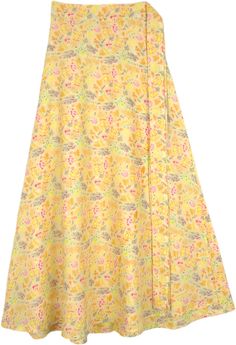 A charming and feminine wrap-around skirt featuring a floral print in a summer yellow color.  As a wrap, it can be worn in many different styles such as a dress or beach cover-up; so, you can transform your look without the hassle. #tlb #WrapAroundSkirt #Floral #Printed #BeachSkirt #WrapSkirt #FloralSkirt Cotton Wrap Skirt For Vacation, Fitted Yellow Wrap Skirt For Spring, Fitted Wrap Skirt For Summer, Flowy Multicolor Wrap Skirt For Summer, Multicolor Summer Wrap Skirt For Vacation, Flared Wrap Skirt For Beach, Multicolor Wrap Skirt For Summer Vacation, Summer Multicolor Wrap Skirt For Vacation, Yellow Maxi Skirt For Spring Beach Occasion