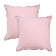 two pink pillows with ruffled edges