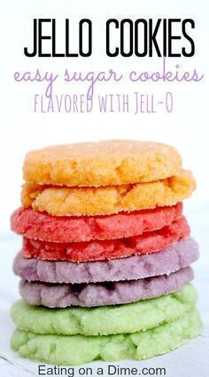 a stack of jelly cookies sitting on top of each other with the words jello cookies easy sugar cookies flavored with jell - o