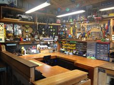 the inside of a garage with many tools