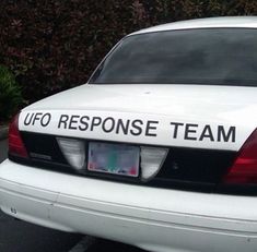 a white police car with the words ufo response team on it's side