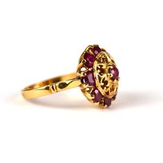 Gold ring , Marquise with rubies  Material :gold ,ruby Weight: 4.980 g  Assay: AU 0.750=18 ct  Stones: rubies  Size: AU 5.5,European 11, diameter 16.24mm  Time of creation: 20th century Ring height: 24mm, Width: 16mm  Ring verified by a jewellery and gemstone expert. The ring comes with a certificate from our stationary shop in Krakow in English with a and a jewellery box. Pomegranate Ring, Gold Ruby Ring, Ruby Ring Gold, Stationary Shop, Ring Marquise, Golden Ring, Krakow, Ruby Ring, Gold Ring