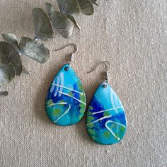 Individually hand painted works of art for your ears. Made lovingly in my home studio in gorgeous Hervey Bay, Queensland. Handmade Artsy Earrings, Artisan Teardrop Earrings With Artistic Design, Artsy Hand Painted Jewelry For Crafting, Handmade Dangle Earrings For Art Collection, Bohemian Hand Painted Earrings For Crafting, Artistic Drop Earrings, Handmade Drop Earrings For Art Collection, Artistic Hand Painted Turquoise Jewelry, Artsy Dangle Earrings With Artistic Design