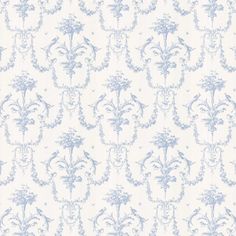 a blue and white wallpaper with flowers on it