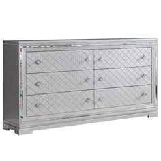 a silver dresser with many drawers and knobs